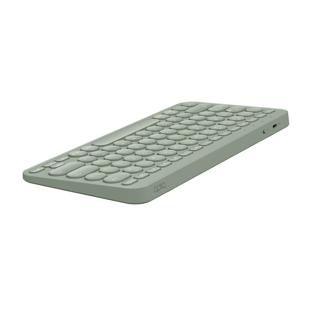 Stijlvol, compact groen draadloos Bluetooth toestenbord, afgeronde hoeken en ronde toetsen, opladen met USB-C, liggend schuin van achteren gezien op witte achtergrond